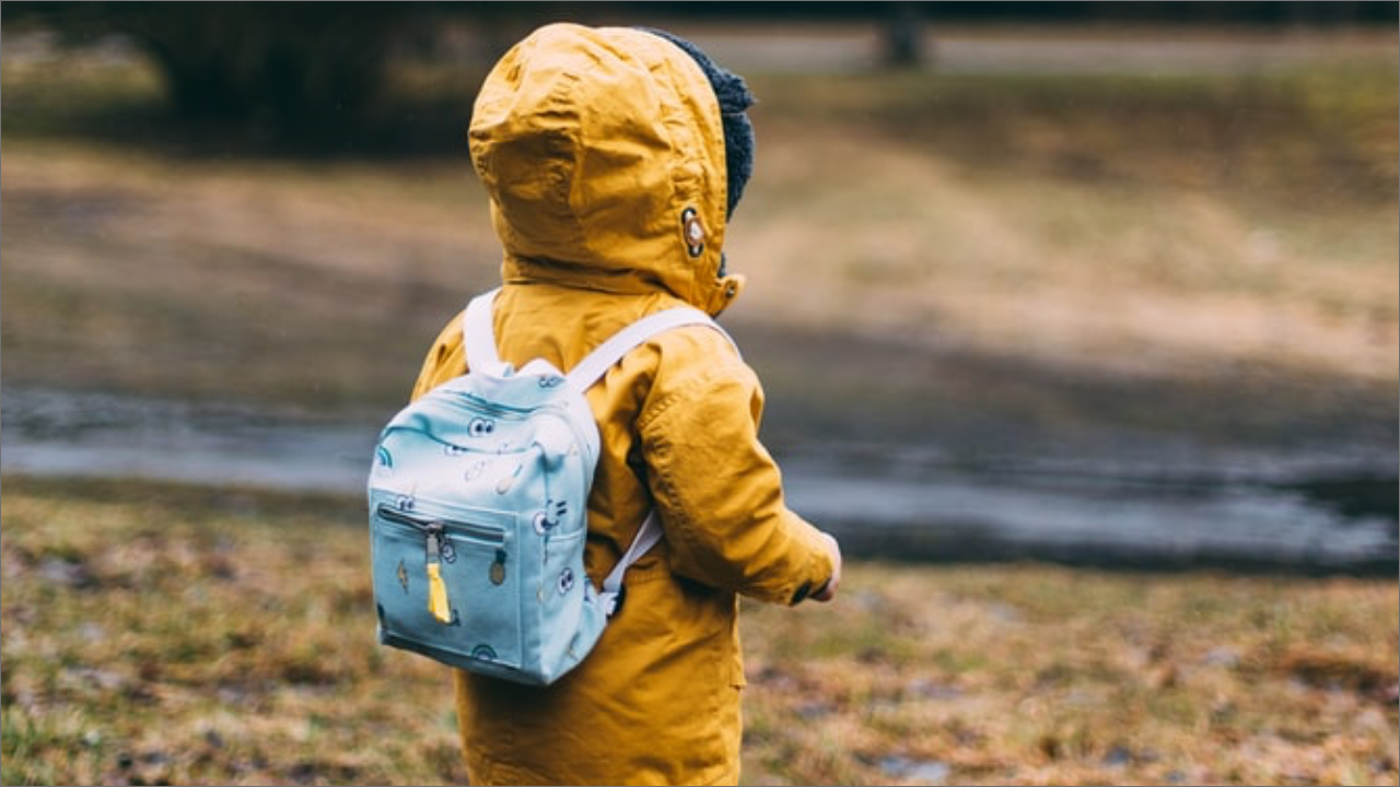 child wearing raincoat