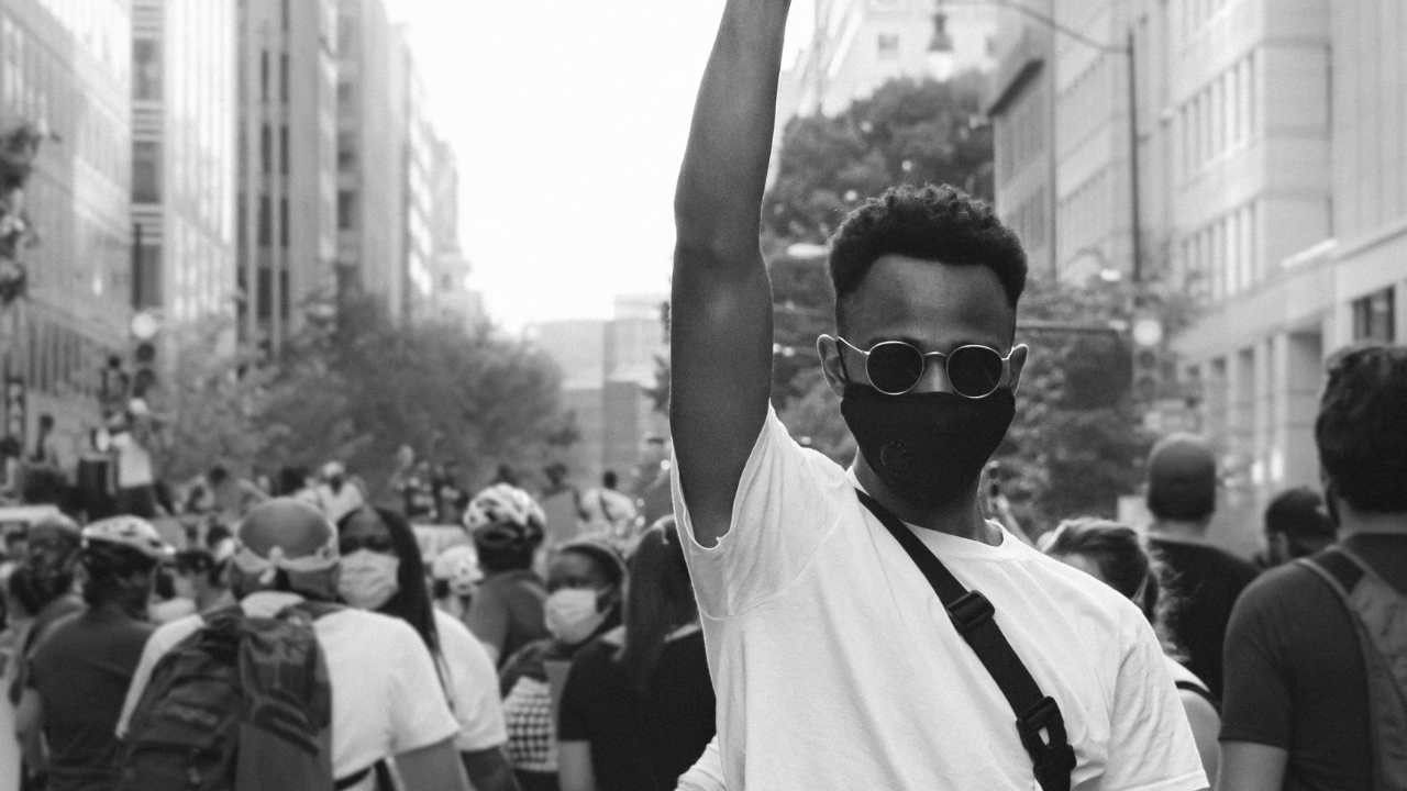 Man raising his fist up
