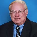 Dr. Dennis Brennan